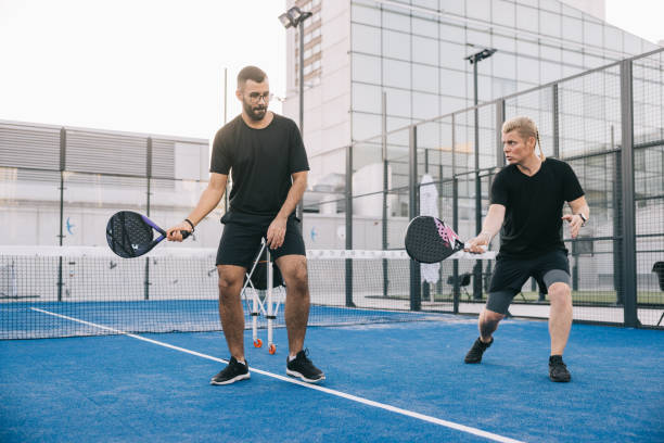 istock Learning paddle tennis on outdoor court 1423558587