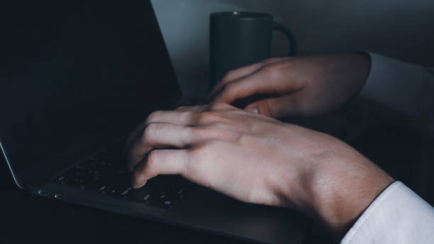 istock Man hands with blank laptop screen closeup concept image 1423559190