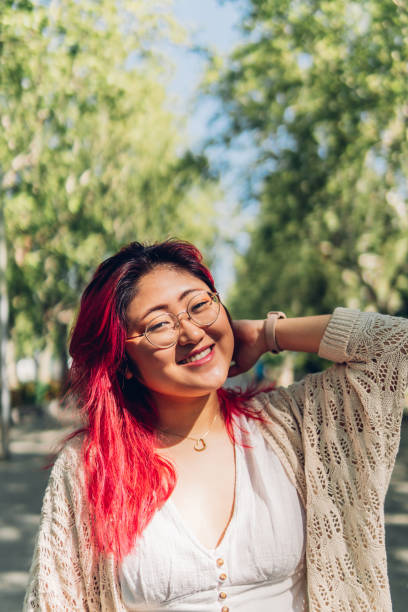 istock Happy woman with closed eyes 1423560788