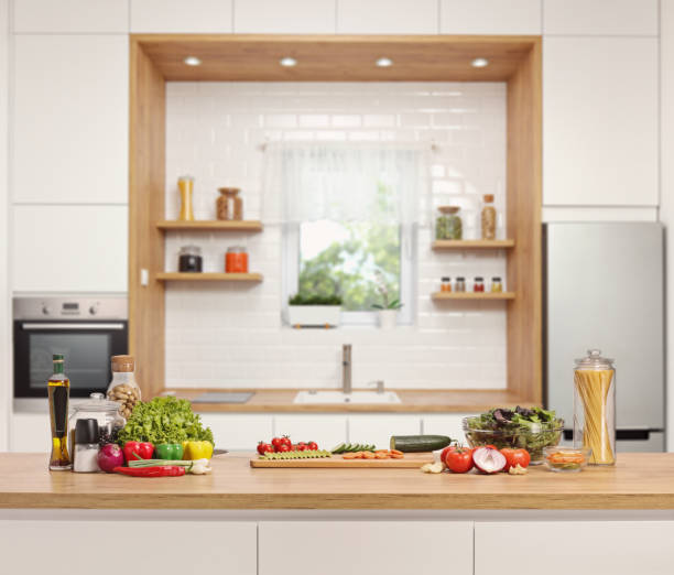 istock Vegetables and a salad bowl on a kitchen counter 1423563242
