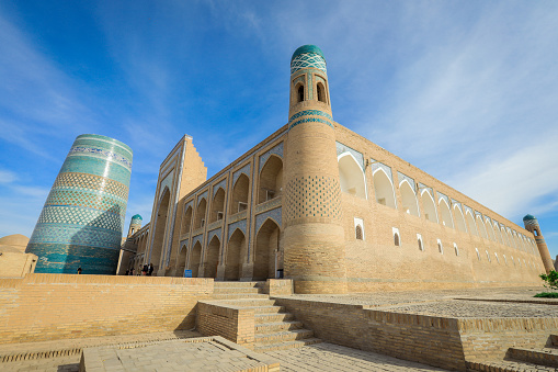 View to the unfinished Kalta Minor Minaret with Blue Mosaic Walls, which is built by Mohammed Amin Khan, in Khiva, Uzbekistan