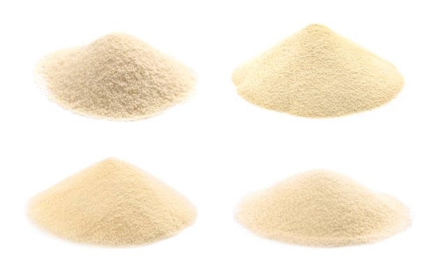 istock Set with uncooked organic semolina on white background 1423565202
