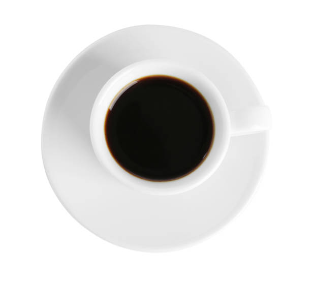 istock Cup of tasty coffee isolated on white, top view 1423566536