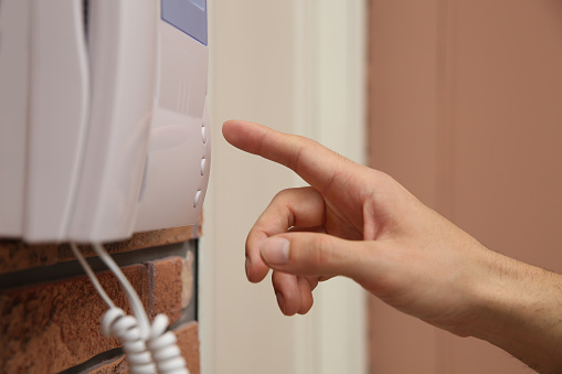 Pressing Intercom Man Pressing Button On Intercom Panel Indoors Closeup Stock Photo ...