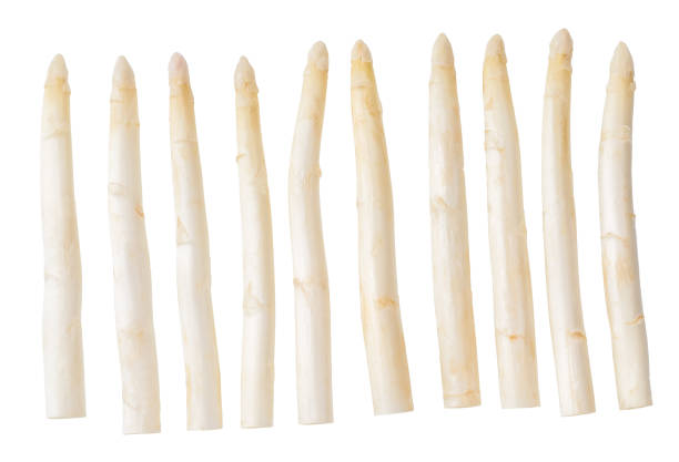 istock Fresh white asparagus isolated on white background. 1423568244