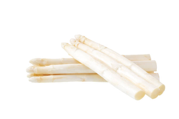 istock Fresh white asparagus isolated on white background. 1423568255