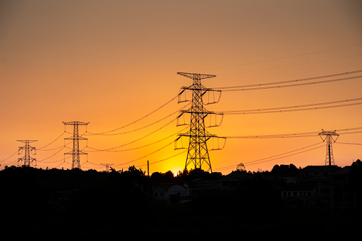 high voltage electricity tower sunset time lapse photography