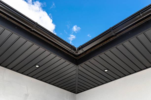 istock A modern graphite herringbone roof lining is attached to the trusses, visible turned on LED lights. 1423570198