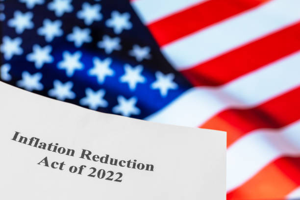 istock Inflation Reduction Act and US flag 1423570276