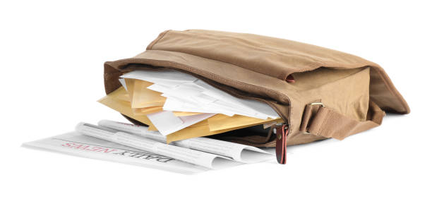 istock Brown postman bag with mails and newspapers on white background 1423573459