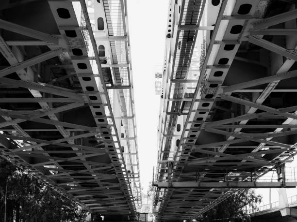 under two railway bridges - bw photo