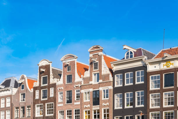 istock Amsterdam downtown canal district during summer 1423575642