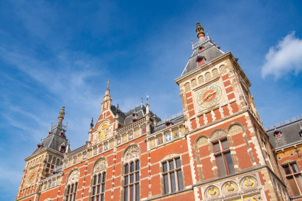 istock Amsterdam downtown canal district during summer 1423575734