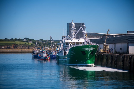 Douarnenez, France - July 09, 2022: Fishing vessels in Douarnenez Harbor