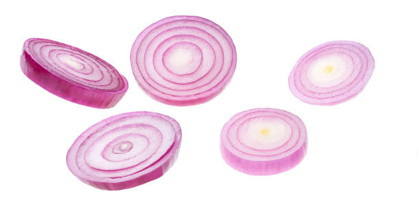 istock Sliced red onion rings isolated on white background with clipping path. 1423577498