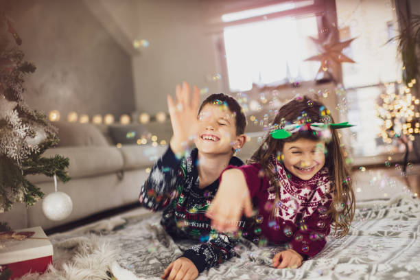 istock Happy children on Christmas Eve 1423577616