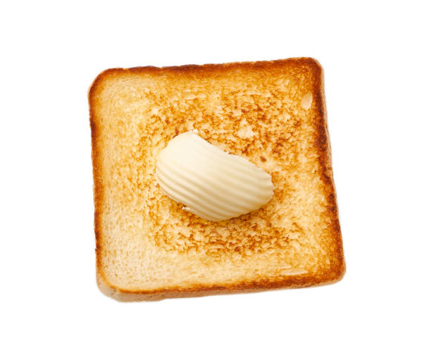istock sandwich bread slices with butter isolated on white background 1423579638