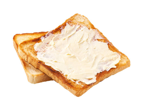 istock toasted bread and butter isolated on white background 1423579659