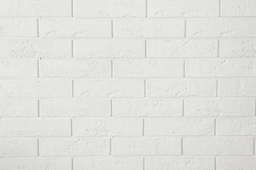 white plaster bricks on the wall