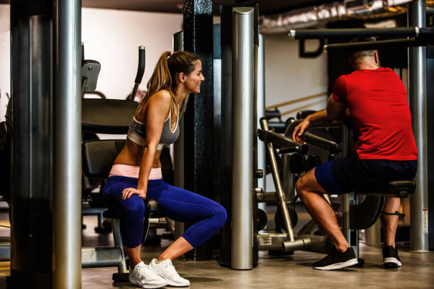istock Athletes taking a break in between sets of strength exercises 1423583792