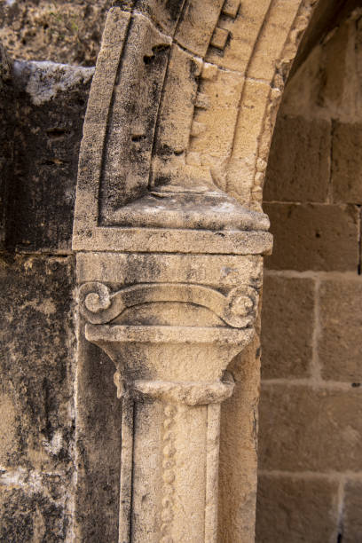 istock Agios Mamas church with unfinished sculpting work on column supporting cracked arch 1423588782