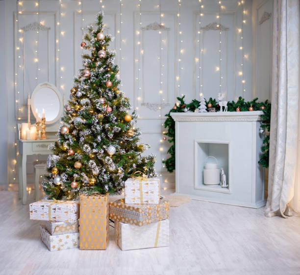 istock Beautiful holdiay decorated room with Christmas tree with presents under it 1423588792