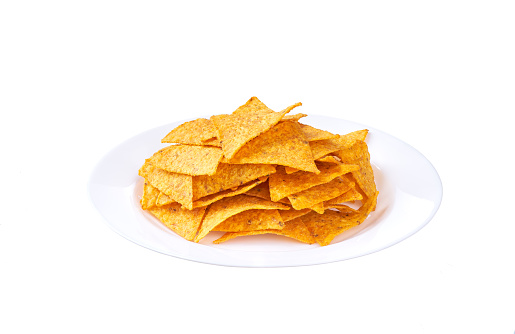 orange mexican nachos chips on white small plate