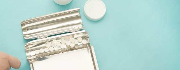 istock pills on tray are counted by pharmacist 1423592627