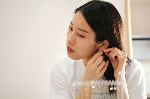 Woman wearing earrings