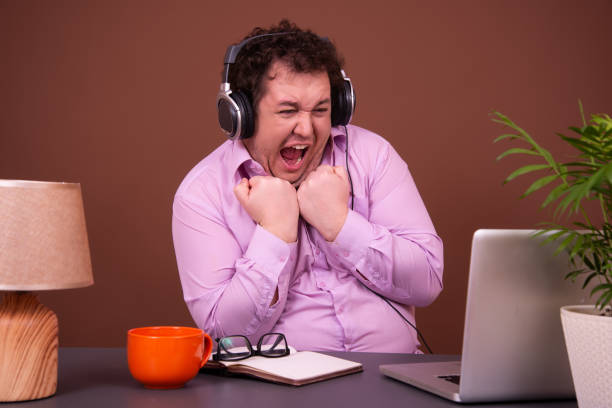 istock Early morning. Funny man with a hot drink. 1423593719