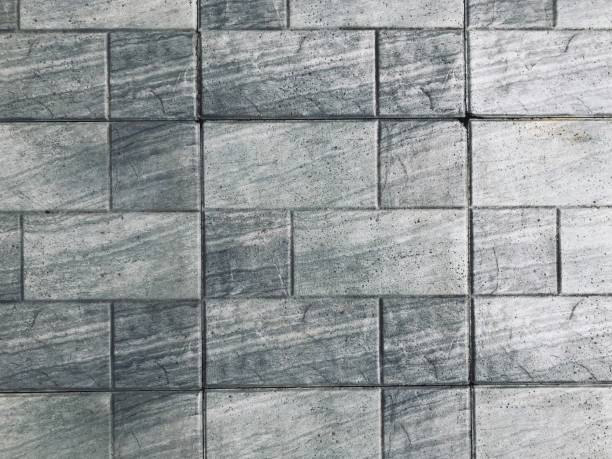 istock Gray stone brick in daylight on outdoor 1423595162