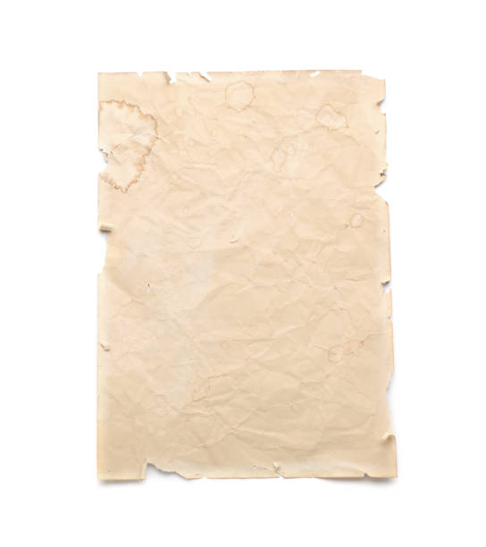 istock Sheet of old parchment paper isolated on white, top view. Space for design 1423598225