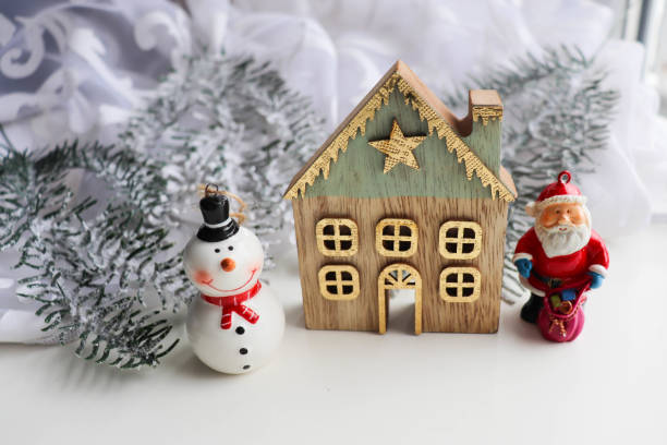 istock fir branches, christmas tree decorations, garlands and a gift box with a bow 1423598235