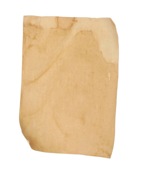 istock Sheet of old parchment paper isolated on white. Space for design 1423598253