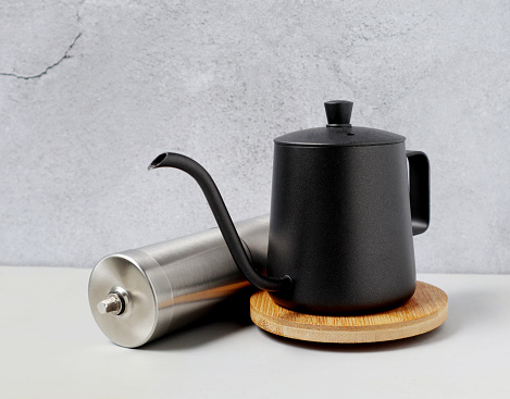 Close-up photo., Kettle for making coffee and disassembled coffee grinder., drip coffee equipment.