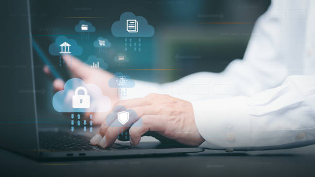 istock businessman using laptop Login to cyberspace through secure online technology and password protection and authentication to authenticate privacy,access to cybersecurity information. 1423603397