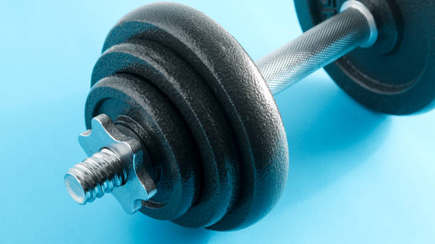 istock Fitness Sport Background eith dumbbells 1423604666