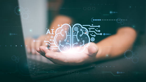 istock Businessman holding virtual AI icon in hand, artificial intelligence future innovation concept, cloud computing network technology with global connection big data database, 1423614319