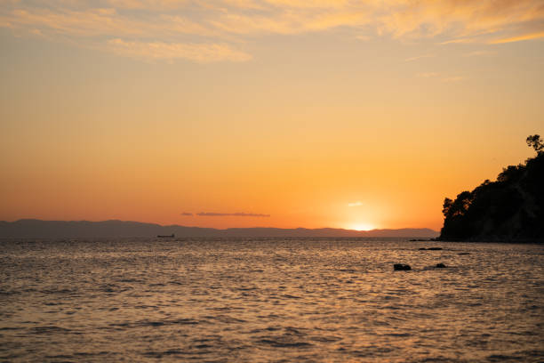 Amazing sunset over Aegean sea in Greece