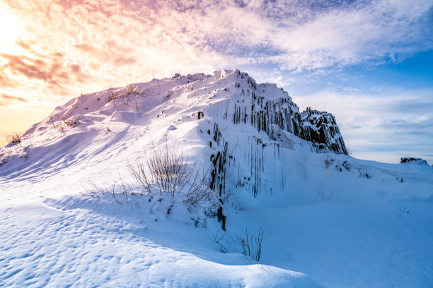 istock Rock organ pipes in winter time 1423622058