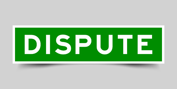 Sticker label with word dispute in green color on gray background