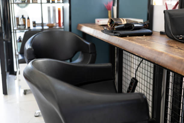 istock black barber chair in front of the mirror 1423626219