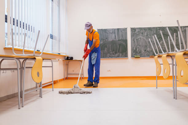 istock Hygiene worker cleaning the classroom floor 1423628182