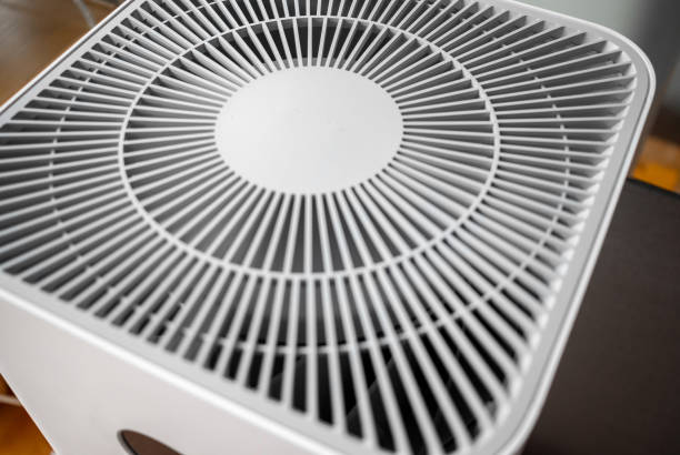 istock Air purifier system cleaning dust pm 2.5 pollution in living room 1423628948