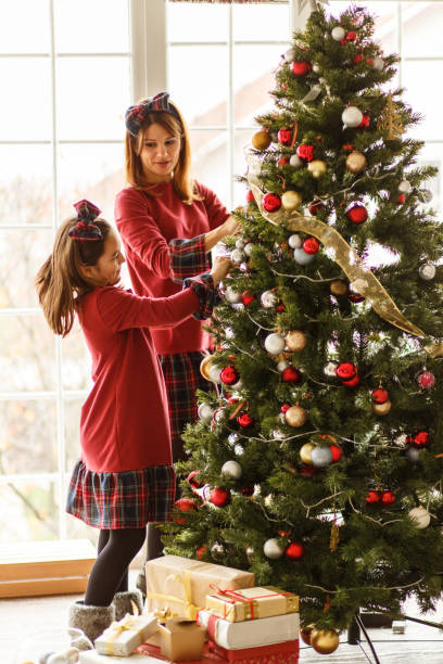 istock Bonding moments while decorating the Christmas tree together 1423629866