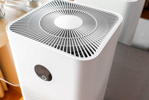 istock Air purifier system cleaning dust pm 2.5 pollution in living room 1423630982