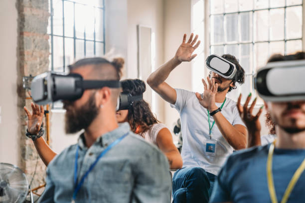 istock People wearing virtual reality VR goggles during a conference 1423632915
