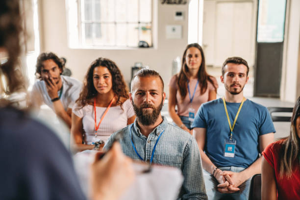istock Group of people sitting during a meeting 1423632942