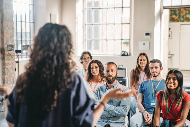 istock Group of people sitting during a meeting 1423632952