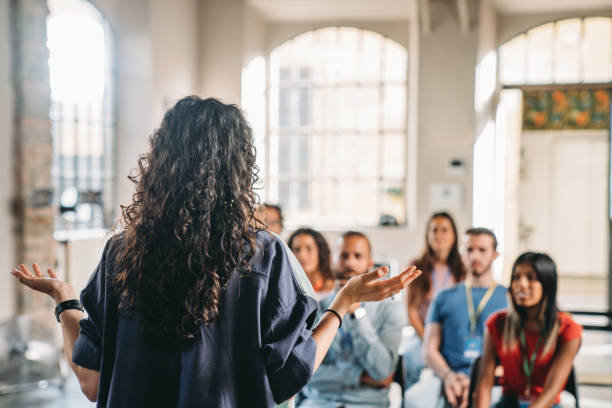 istock Group of people sitting during a meeting 1423632984
